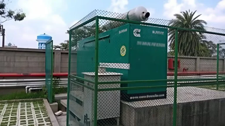 Outdoor industrial DG generator installation with safety enclosure